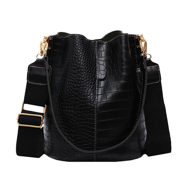 This stylish single shoulder bucket handbag offers timeless design and superior craftsmanship
