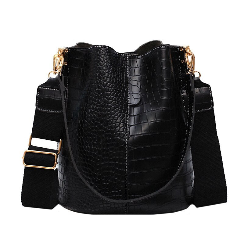 This stylish single shoulder bucket handbag offers timeless design and superior craftsmanship